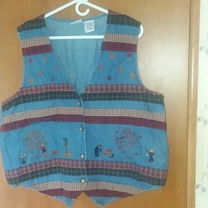 A denim vest with fall accent colors and scenes.